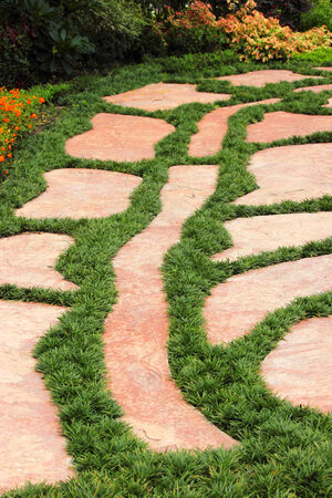 Walkway brick red color in the gardenの写真素材