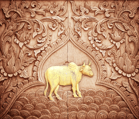 Pattern of flower carved on wood backgroundの写真素材