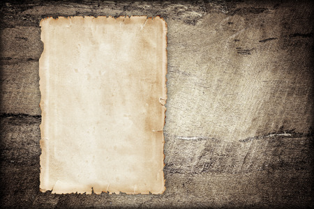 Old paper on wood background.の写真素材