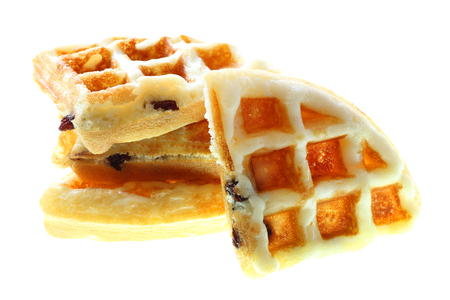 Freshly waffles with raisin on white backgroundの写真素材
