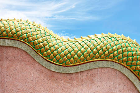 Big scaly Naga snake guarding Thai templeの写真素材