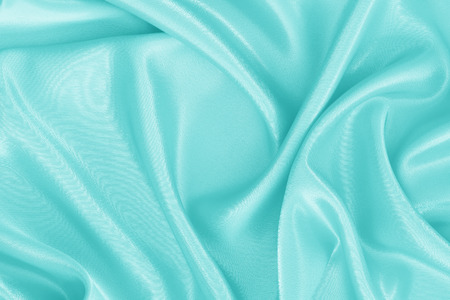 abstract background luxury cloth or liquid wave or wavy folds of grunge silk texture satin velvet materialの写真素材