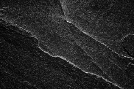 Dark grey black slate background or natural stone texture.の写真素材