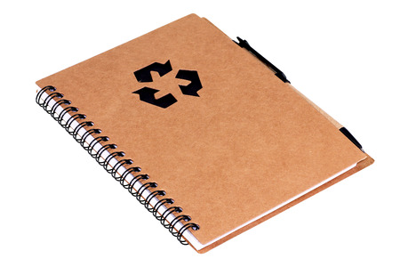 Note book with pen isolated on whiteの写真素材