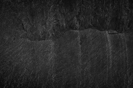 Dark grey black slate background or texture. black stoneの写真素材