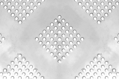 Metal plate with many small circular holes