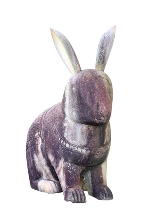 stone rabbit statue isolated on white backgroundの写真素材