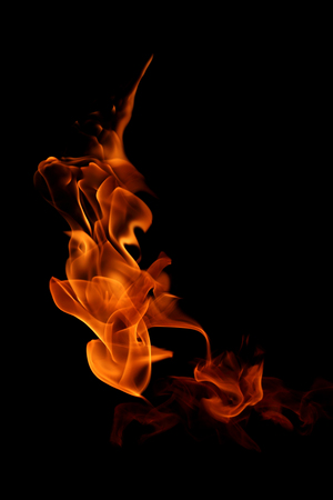 Fire flames isolated on black background.