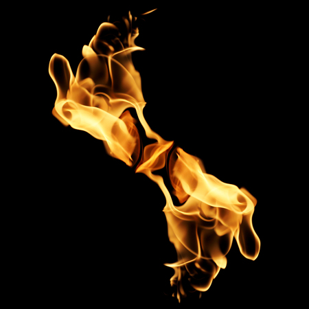 Fire flames isolated on black background.