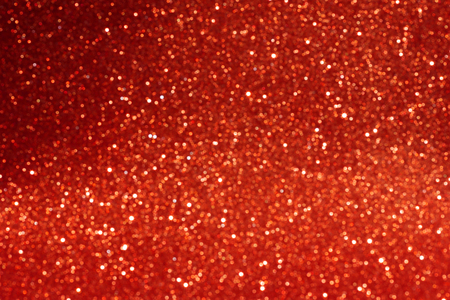 Abstract red sparkling glitter bokeh background with light.