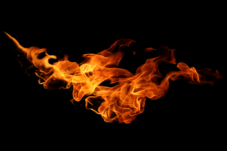 movement of fire flames isolated on black background. abstract backgroundの写真素材