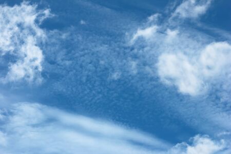 The vast blue sky nature background and white clouds soft focus