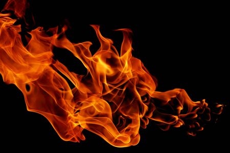 movement of fire flames isolated on black background. abstract backgroundの写真素材