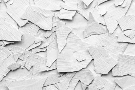 Broken white concrete surface background, plasters crack texture abstract backgroundの写真素材
