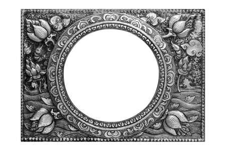 Pattern of flower carved silver picture frame isolated on white backgroundの写真素材