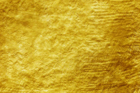 Gold texture background and gradient shadow, pattern of golden wall abstract backgroundの写真素材