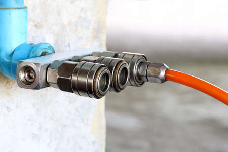 Air quick coupling, old quick coupler, air piping system in factory.の写真素材