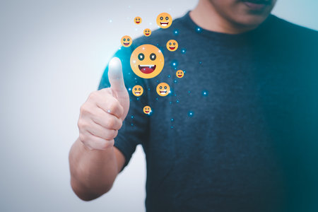 Satisfaction survey and customer service concept, businessman using a smartphone to answer the questionnaire and give a satisfaction rating, offering a 5-star satisfaction ratingの写真素材