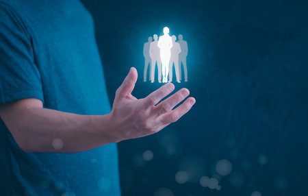 Businessman showing clients on holographic global network structure and the exchange of information, the concept of connecting information around the world with technology internet, digital marketingの写真素材