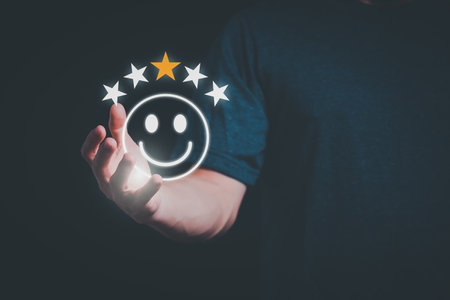 Satisfaction survey concept and customer service, using digital media technology, questionnaire, and rating satisfaction, rating satisfaction five stars, searching for information, online marketingの写真素材