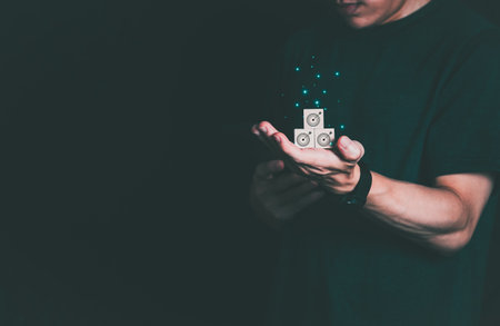 The person showing clear target on stacked wooden blocks on hand progress concept or success concept global data connection big data searching for information big data and business processesの写真素材