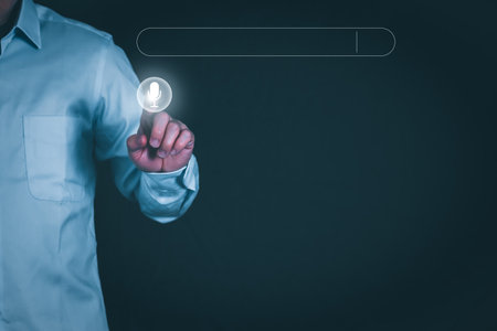Information data search technology, search optimization, male hand using voice search, using the search bar function on your website, big data, automatic operationの写真素材