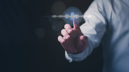 Close up of a businessman touching a virtual AI voice assistant interface with sound waves. Concept of artificial intelligence speech recognition, smart technology, and futuristic communication.の写真素材
