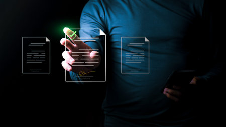 Businessman signing a digital document with an electronic signature on a virtual screen, Concept of paperless office secure legal contract management, and online transaction agreement technology.の写真素材