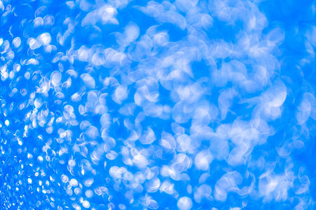 defocused abstract blue lights backgroundの写真素材