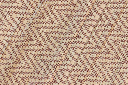 texture of native thai style weave sedge mat backgroundの写真素材