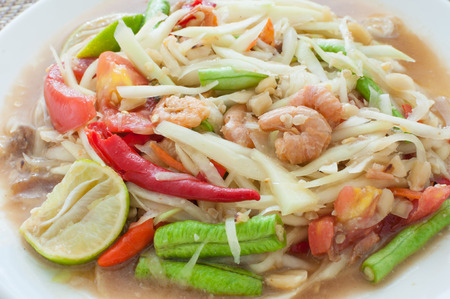 green papaya salad hot and spicy thai cuisine, som tum thai speakの写真素材