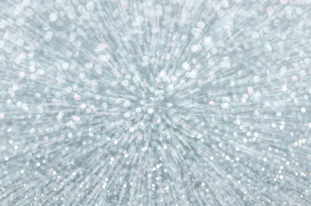 silver abstract explosion with defocused lights backgroundの写真素材