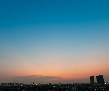 blue sky over the city after sunsetの写真素材
