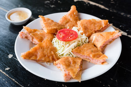 deep fried spring roll with sweet plum sauceの写真素材