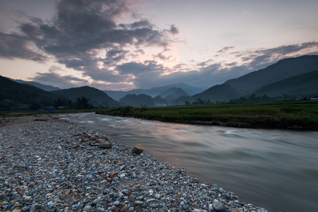 Beautiful landscape river with rice fields on terraced of Mu Cang Chai, YenBai, Vietnamの写真素材