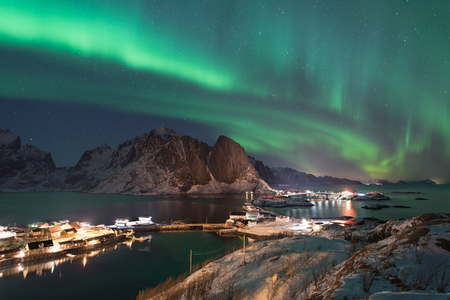 Northern lights over the Hamnoy village at night in winter season, Lofoten islands, Norway, Europeの写真素材