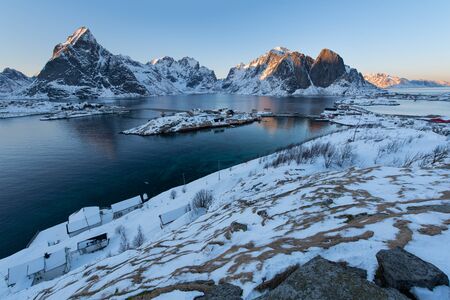 Beautiful landscape aerial view of Sakrisoy fishing village at sunset in winter season, Lofoten islands, Norway, Europeの写真素材