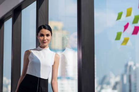 Portrait of young businesswoman working in the office
