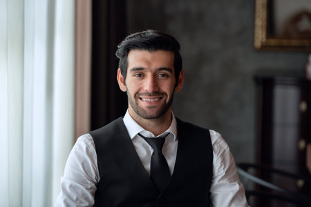 Portrait of young handsome confident businessman, business conceptの写真素材