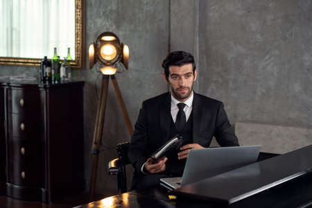 Portrait of young handsome confident businessman, business conceptの写真素材