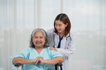 Senior care, hug and portrait of Asian nurse with senior female patient for medical help, elderly care conceptの写真素材