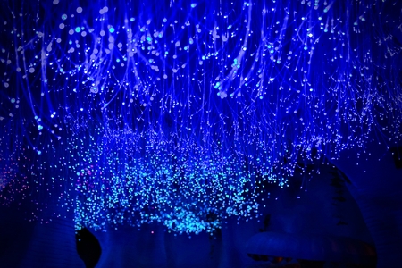Fantastic blurry and bokeh dark blue theme background in the mystry cave.の写真素材