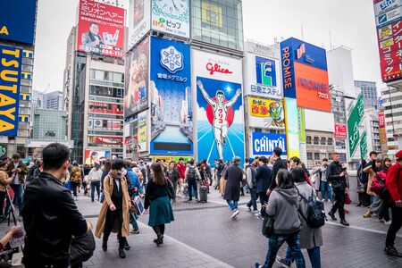 Osaka, Japan - 3 Mar 2018: The Gulico man digital signage billboard is the popular landmark / tourist attraction in the noon at Namba district, Osaka, Japan.のeditorial素材