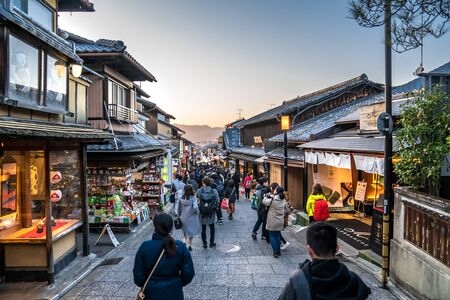 Kyoto, Japan - 2 Mar 2018: People (traveler, group tour, local people, Japanese people) walking and shopping, food, snacks and souvenir at the street front of Kiyomizu-dera temple on 2 Mar 2018, Kyoto, Japan.のeditorial素材