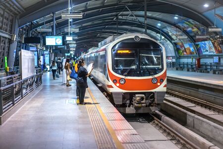 BANGKOK, THAILAND - 2 Apr, 2018: Thai Passenger waited for sky train; Airport Rail Link on the platform at Phaya Thai Station (A8) going to suvarnabhumi airport and other stations.のeditorial素材