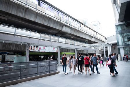 Bangkok, Thailand - 4 â€‹Aug, 2018: People walking in the link way between BTS sky train and...
