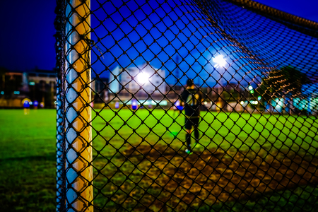 football goal net at the field with blur background.の写真素材