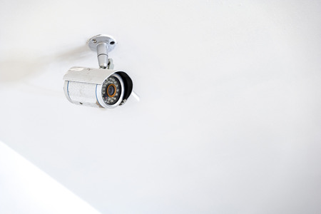 cctv camera hang on to ceiling in the office, Thailand.の写真素材