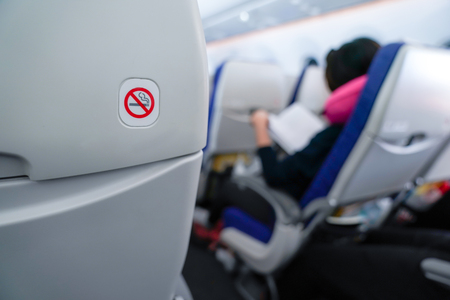 no smoking sign on plane seat.の写真素材