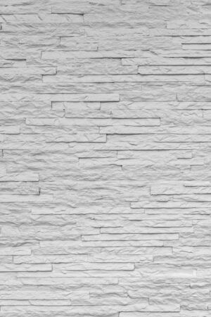 White classic stone brick are arranged to pattern on the wall for beautiful minimal and simpleの写真素材